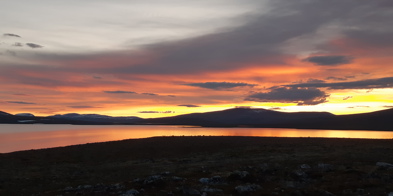 Landskap I Solnedgang Tatt Av H Helland